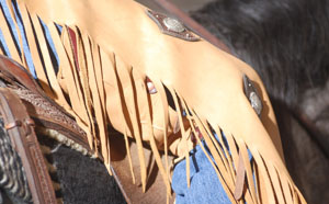 custom leather reining chaps with silver conchos