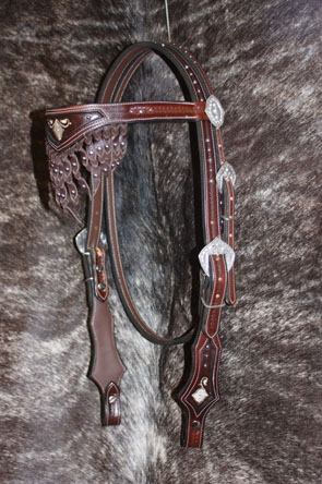 headstall with silver buckles and conchos